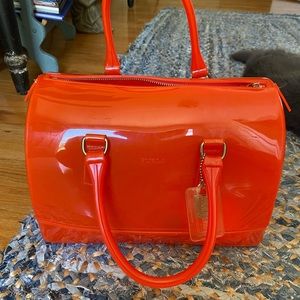 Furla candy bag. Tangerine. Lightly used. Great condition. No odor